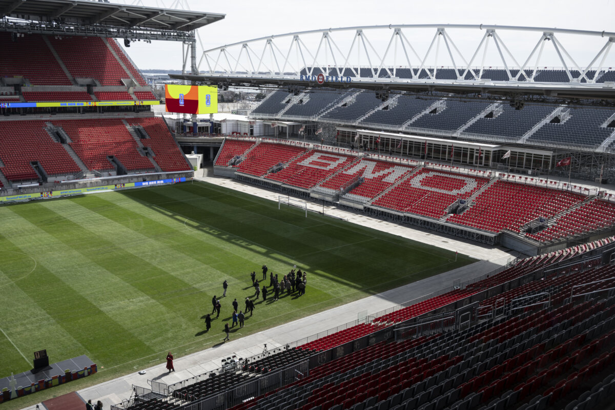 Media are seen on the pitch of BMO Field during a tour organized by MLSE and the City of Toronto to showcase the stadium’s upgrades ahead of hosting six FIFA World Cup 2026 matches in Toronto, on March 24, 2026. (The Canadian Press/Eduardo Lima)