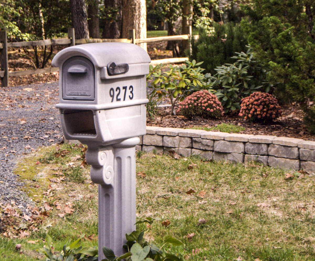 A good choice is a mailbox designed with a front and rear opening so it's easy to open from either end. (Gene Hamilton/TCA)