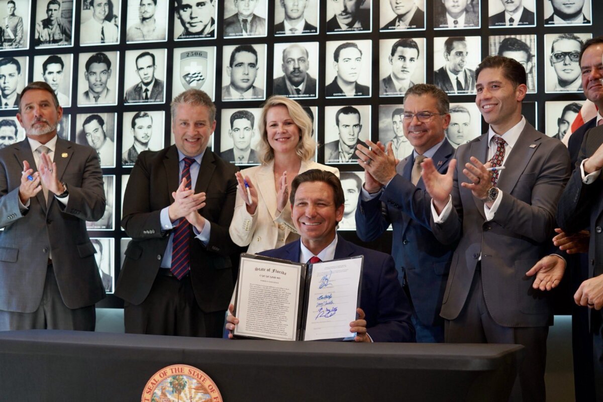 Florida Gov. Ron DeSantis signs HB 905, the "Foreign Interference Restriction and Enforcement Act," into law on May 8, 2026. (Office of Gov. Ron DeSantis)