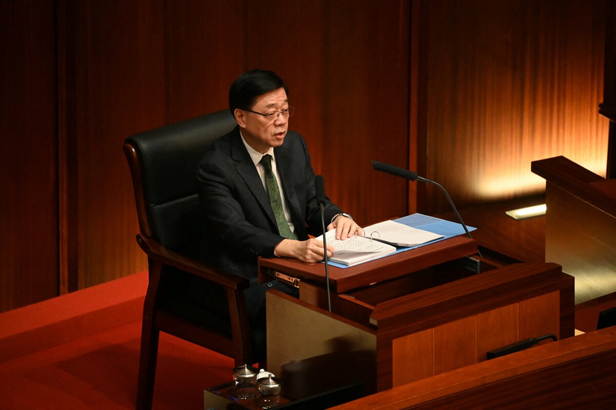 Hong Kong Chief Executive John Lee delivers his annual policy address in the Legislative Council chamber in Hong Kong on Oct. 16, 2024. (Peter Parks/ AFP via Getty Images)