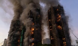 7 People, 2 Companies Charged Over Hong Kong Fire That Killed 168 People