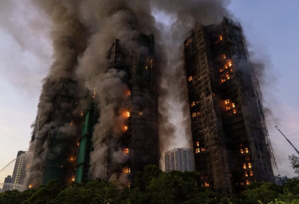 7 People, 2 Companies Charged Over Hong Kong Fire That Killed 168 People