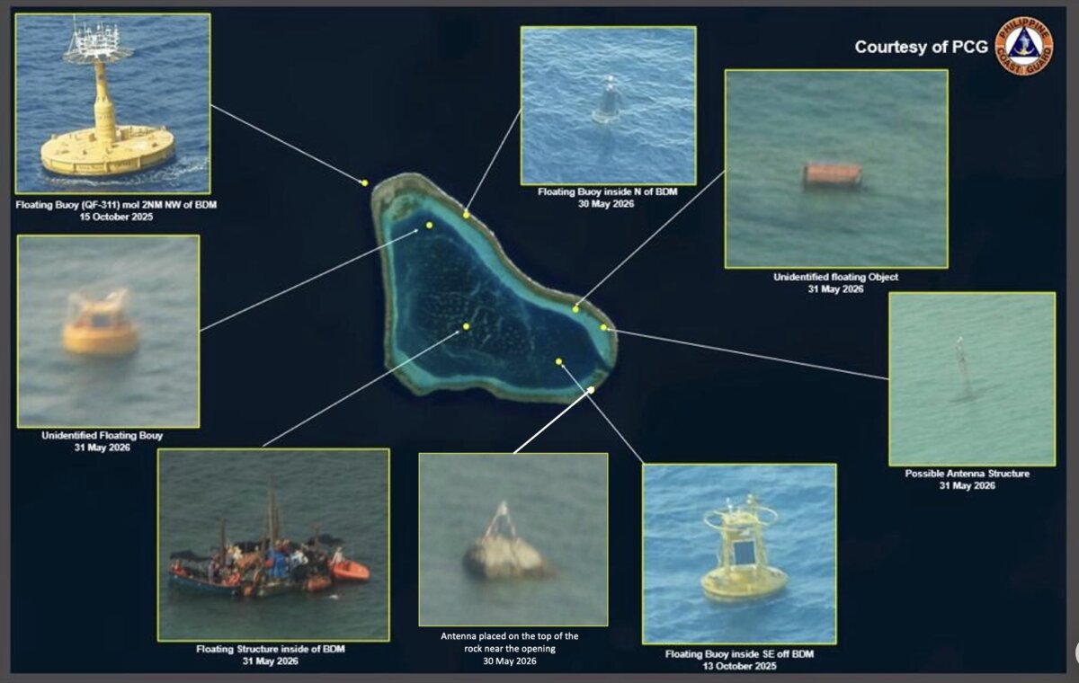 Philippine Coast Guard spokesperson Jay Tarriela documents Chinese-installed structures at Bajo de Masinloc (Scarborough Shoal), including a movable floating platform, three new buoys atop earlier ones from October 2025, an unidentified spherical object, and two antennas, at a press briefing in the Philippines on June 10, 2026. (Courtesy of Philippine Coast Guard)