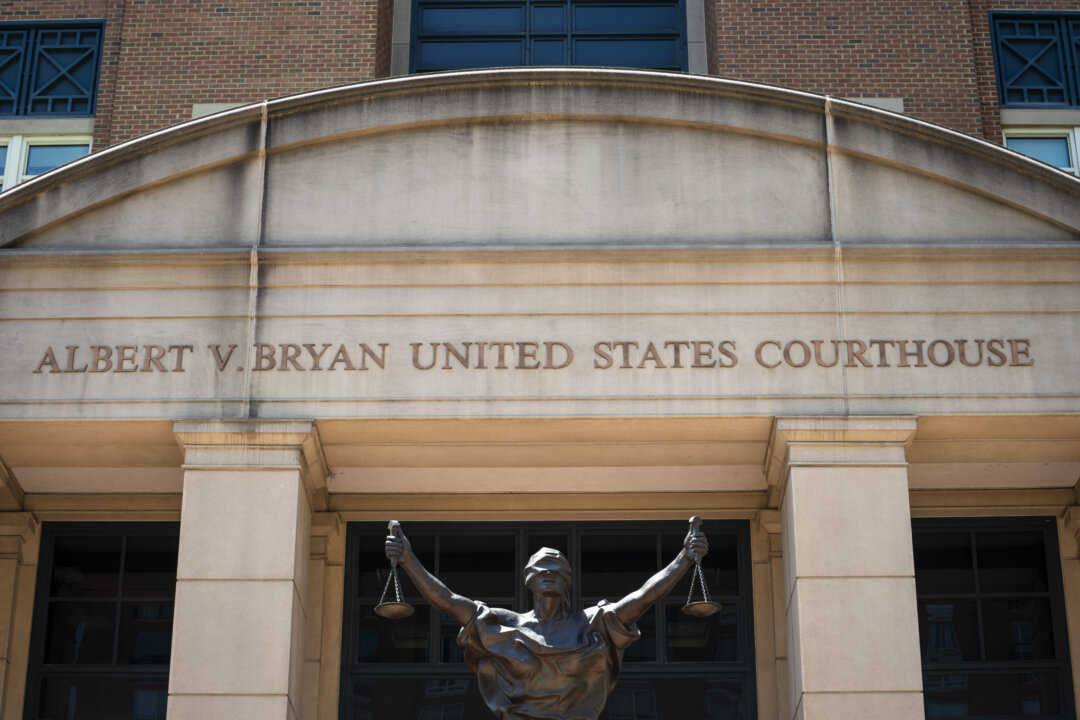 US Journalist Sentenced to 2 Years in Prison for Acting as Chinese Agent