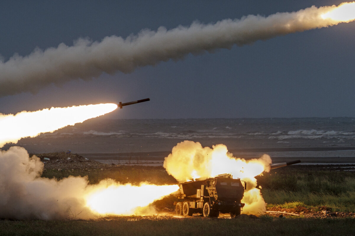 A Taiwanese Army M142 High Mobility Artillery Rocket System (HIMARS) launches projectiles during a live-fire training exercise in Taichung, Taiwan, on June 10, 2026. (Cheng Yu-chen/AFP via Getty Images)