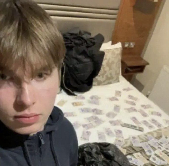 A selfie that Johannes Natland took of himself next to a hotel bed covered with British money, in Huddersfield, England, on March 19, 2025. (Metropolitan Police)