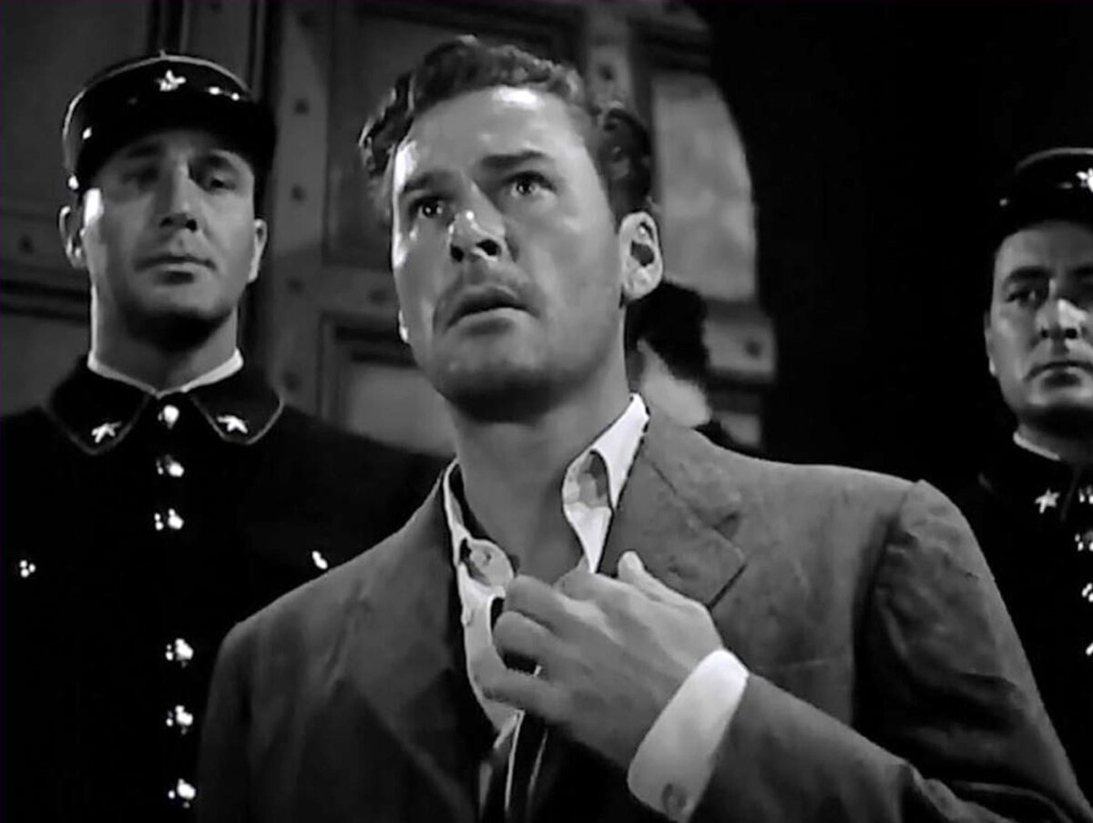 Jean Picard (Errol Flynn), in “Uncertain Glory.” (Warner Bros.)