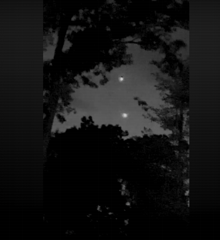 In July 2025 in the northeastern United States, an eyewitness observed an intense bright light in their backyard as they parked their car upon returning home from work. This is a screenshot from the witness's personal video. (Screenshot by The Epoch Times/Courtesy of the Pentagon)