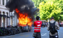 G7 Protesters Smash Windows, Set Tesla on Fire in Geneva