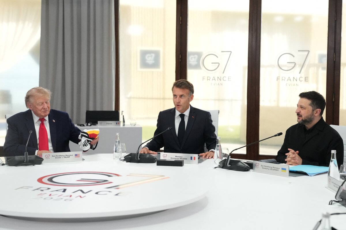 (L-R) U.S. President Donald Trump, French President Emmanuel Macron, and Ukrainian President Volodymyr Zelenskyy take part in a working session at the G7 summit in Evian-les-Bains, France, on June 16, 2026. (Thibault Camus / POOL / AFP)