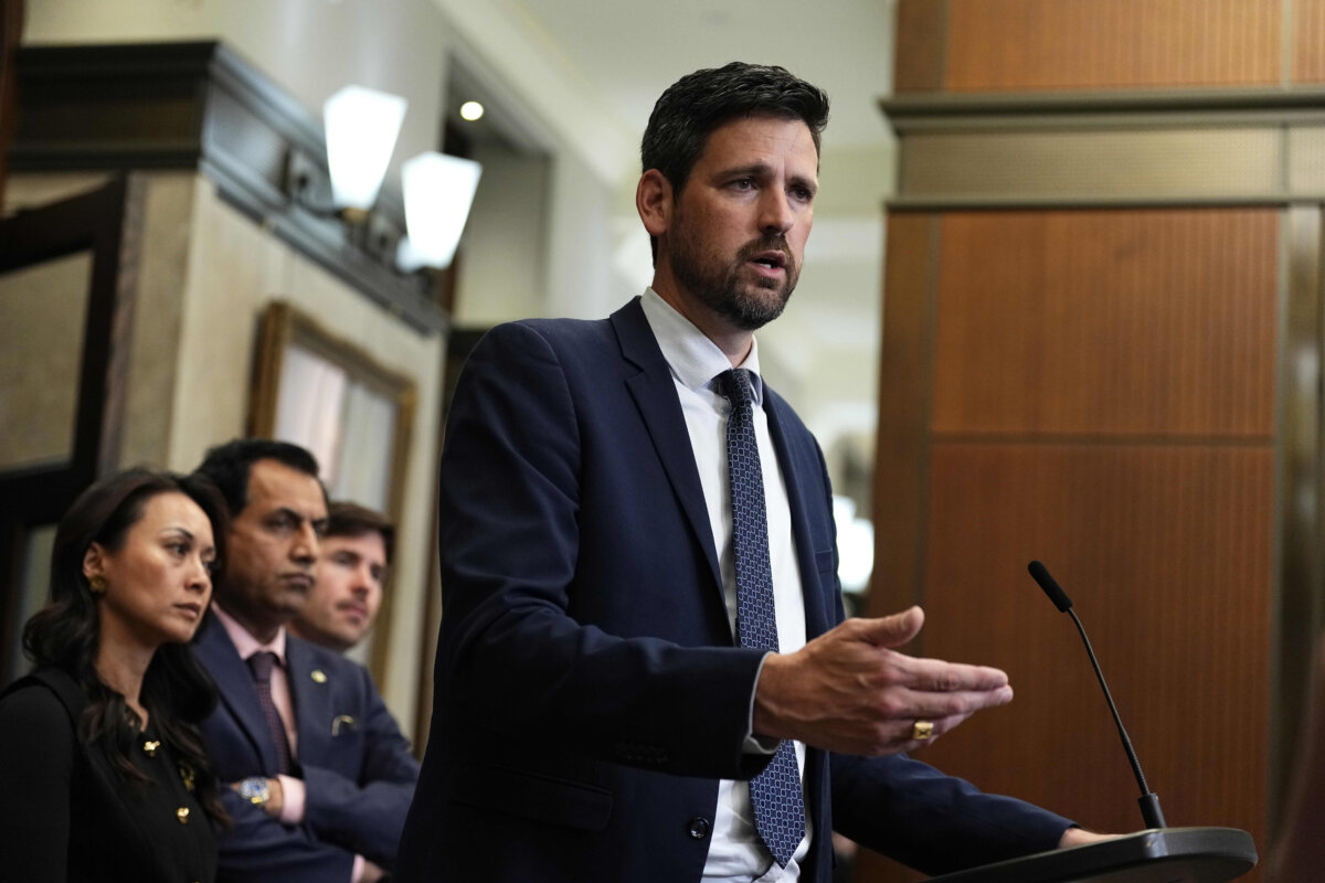Minister of Justice Sean Fraser speaks during a news conference after Bill C-14, the Bail and Sentencing Reform Act, received royal assent, in the foyer of the House of Commons on Parliament Hill on June 16, 2026. (The Canadian Press/Justin Tang)