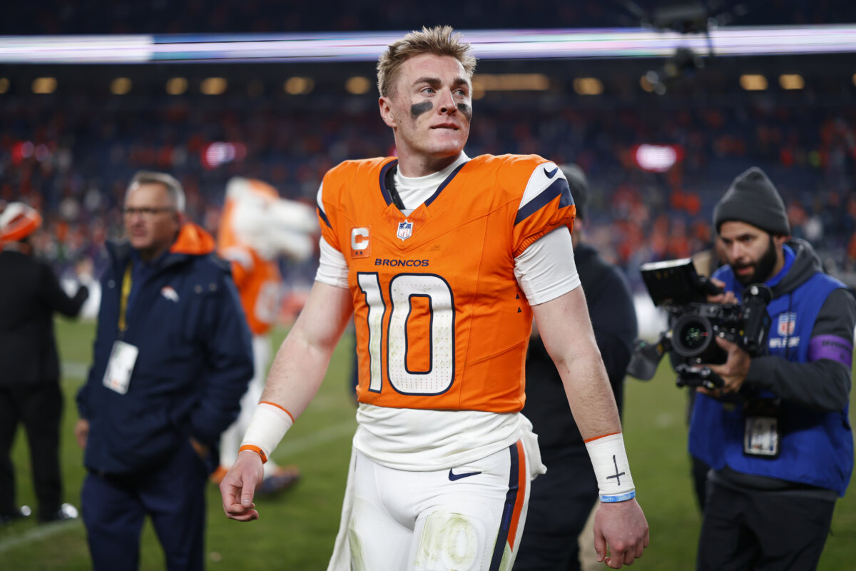 Bo Nix #10 of the Denver Broncos celebrates after defeating the Buffalo Bills with a score of 30 to 33 in overtime of the AFC Divisional Playoff game at Empower Field At Mile High in Denver, Colorado, on January 17, 2026. (Justin Edmonds/Getty Images)