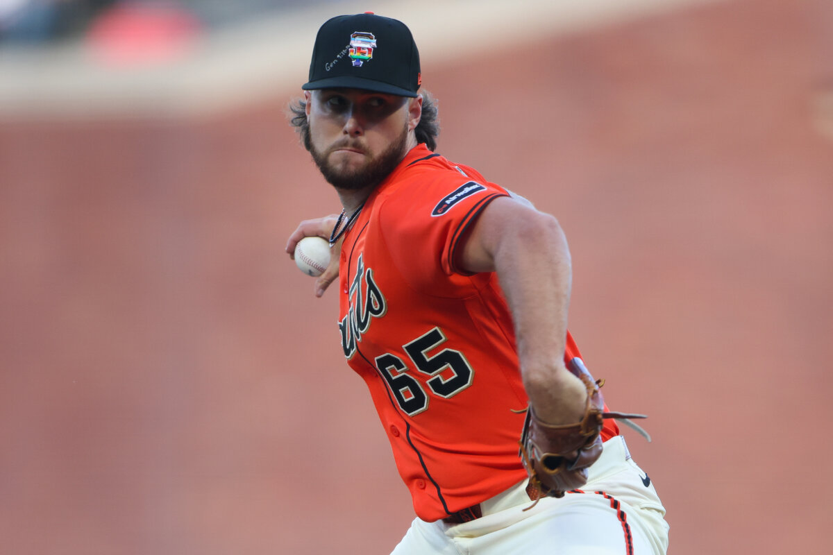 San Francisco Giants pitcher Landen Roupp throws to a Chicago Cubs batter during the first inning of a baseball game in San Francisco on June 12, 2026. (AP Photo/Scott Marshall)