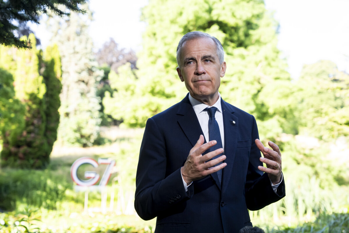 Prime Minister Mark Carney speaks to reporters during the G7 summit in Evian-les-Bains, France, on June 17, 2026. (The Canadian Press/Christopher Katsarov)