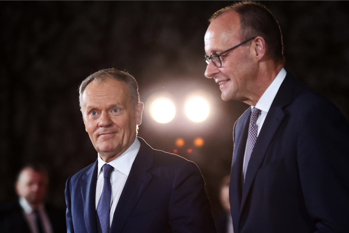 German Chancellor Friedrich Merz (R) welcomes Polish Prime Minister Donald Tusk (L) at the Chancellery in Berlin, Germany, on Dec. 15, 2025. (Maryam Majd/ AP Photo)