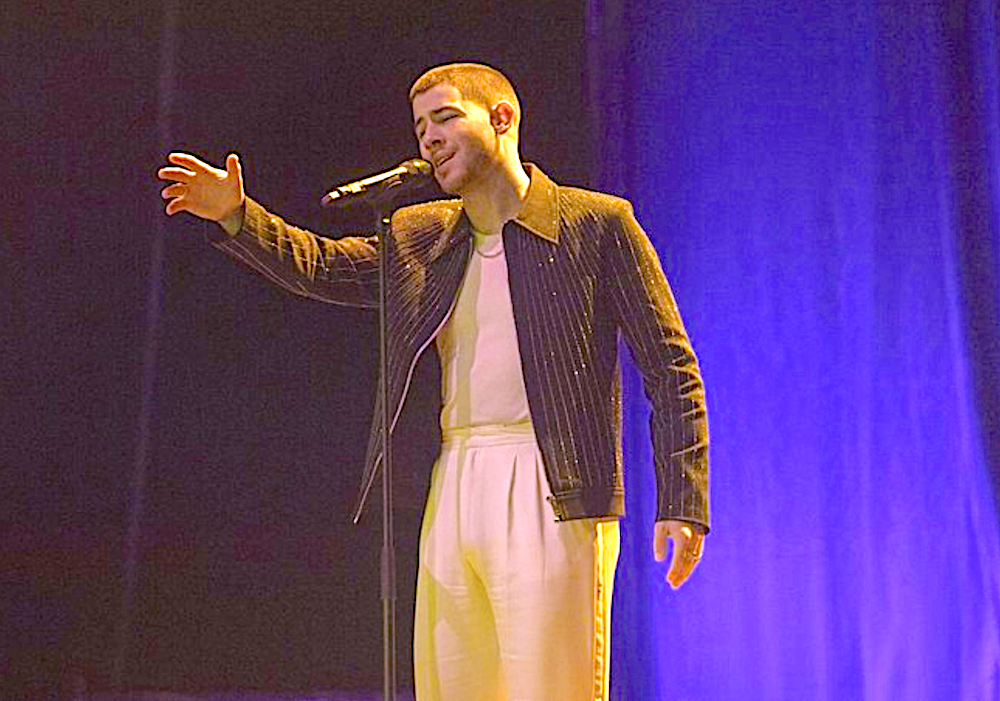 man in white with brown jacket in Power Ballad