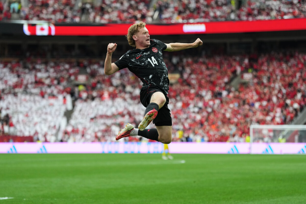 Canada's Jacob Shaffelburg celebrates after Qatar's Mohamed Manai scores an own goal during the World Cup Group B soccer match in Vancouver, British Columbia, on June 18, 2026. (Abbie Parr/AP Photo)