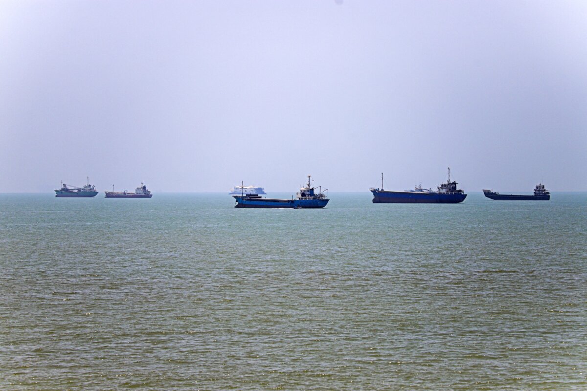 Vessels anchored in Bandar Abbas, Iran, along the Strait of Hormuz, on June 18, 2026. (Amir Hossein Khorgooei/ISNA/AFP)