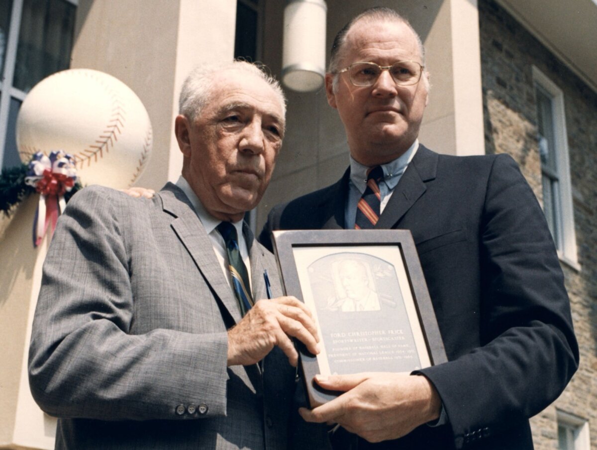 Ford Frick receives a copy of his Baseball Hall of Fame plaque from MLB Commissioner Bowie Kuhn in Cooperstown on July 27, 1970. (Courtesy of Nebraska Press)