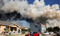 America in Photos: Los Angeles Fire, Beagles Research Facility Closing, and Medal of Honor Ceremony