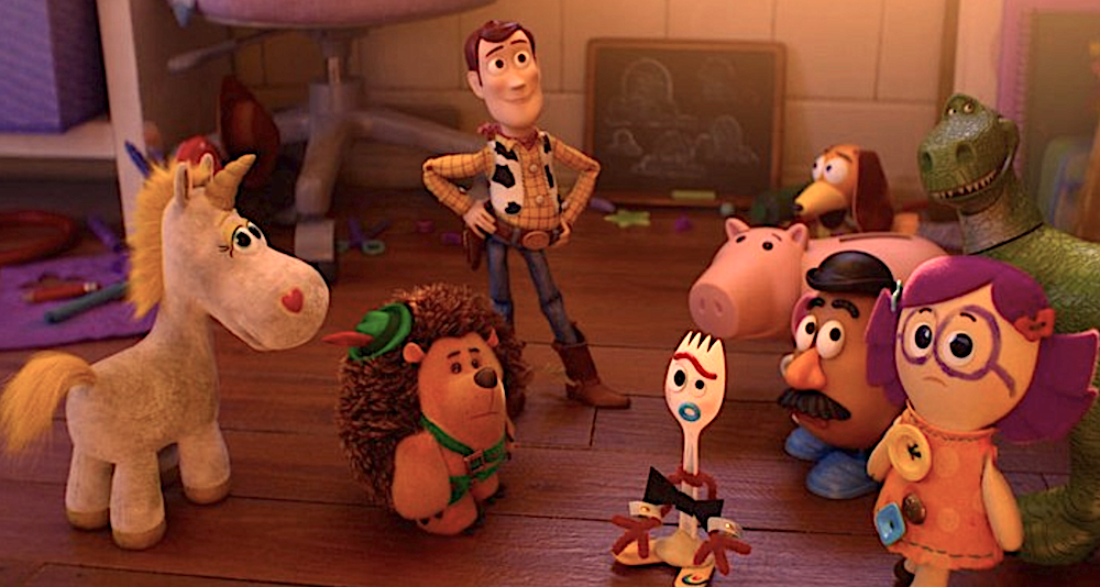 A collection of vintage toys on a hardwood floor in Toy Story 5