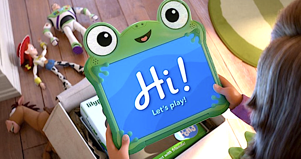 Young girl looking at her new tablet present in Toy Story 5