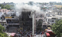Day in Photos: India Fire Disaster, South Africa Protest Rally, and Ancient Mural Uncovered