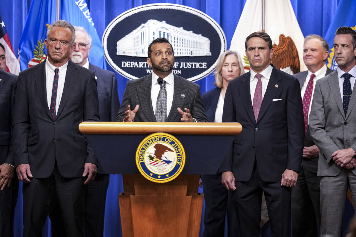 FBI Director Kash Patel (C) flanked by Acting Attorney General Todd Blanche (R) and US Secretary of Health and Human Services Robert F. Kennedy Jr. (L)
, speaks during a press conference announcing annual healthcare fraud takedown results at the Department of Justice in Washington, on June 23, 2026. (Ken Cedeno / AFP via Getty Images)