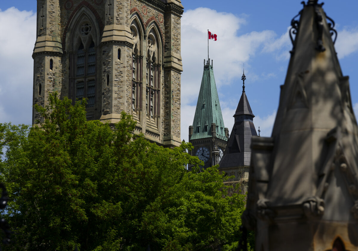 The Canadian flag blows on the Peace Tower on Parliament Hill in Ottawa on May 26, 2026. (The Canadian Press/Sean Kilpatrick)