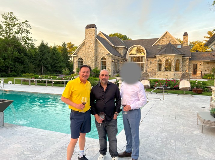 Yan Po Zhu (L) and Frank Carone (C) at Zhu’s Nassau County home. (U.S. Attorney’s Office for the Eastern District of New York)