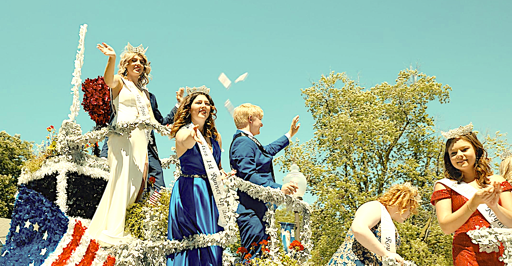 Boys and girls on a beauty pageant float in a Flag Day parade, in "Flag Day." (Shea Productions)
