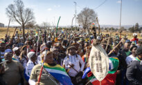 Day in Photos: Soweto Immigration Protest, Heat Wave in Europe, and Battle of Wine