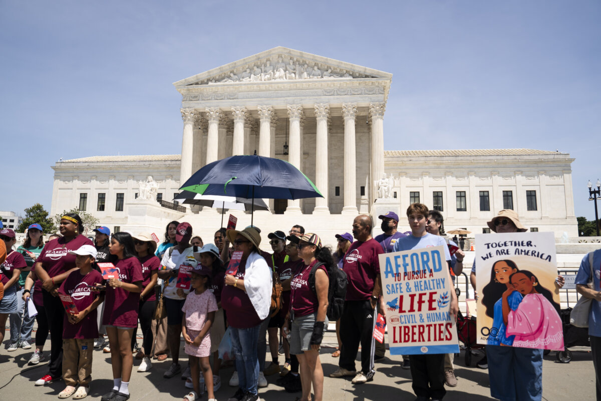 People outside the Supreme Court in Washington on June 30, 2026. (Madalina Kilroy/The Epoch Times)