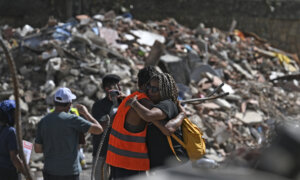 Rescue Teams Attempt to Pull Survivor From Venezuela Rubble