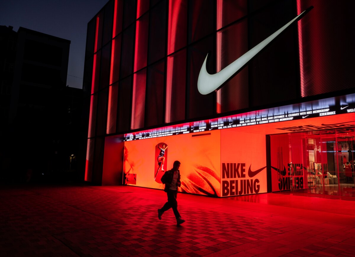 A man walks by a location for sports retailer Nike in a shopping area in Beijing, China, on April 24, 2025. (Kevin Frayer/Getty Images)