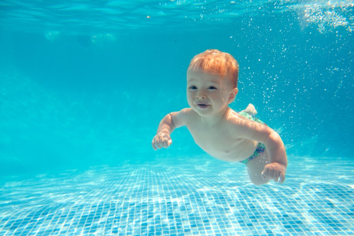 Baby diving during swimming lessons. (Monkey Business Images/Shutterstock)
