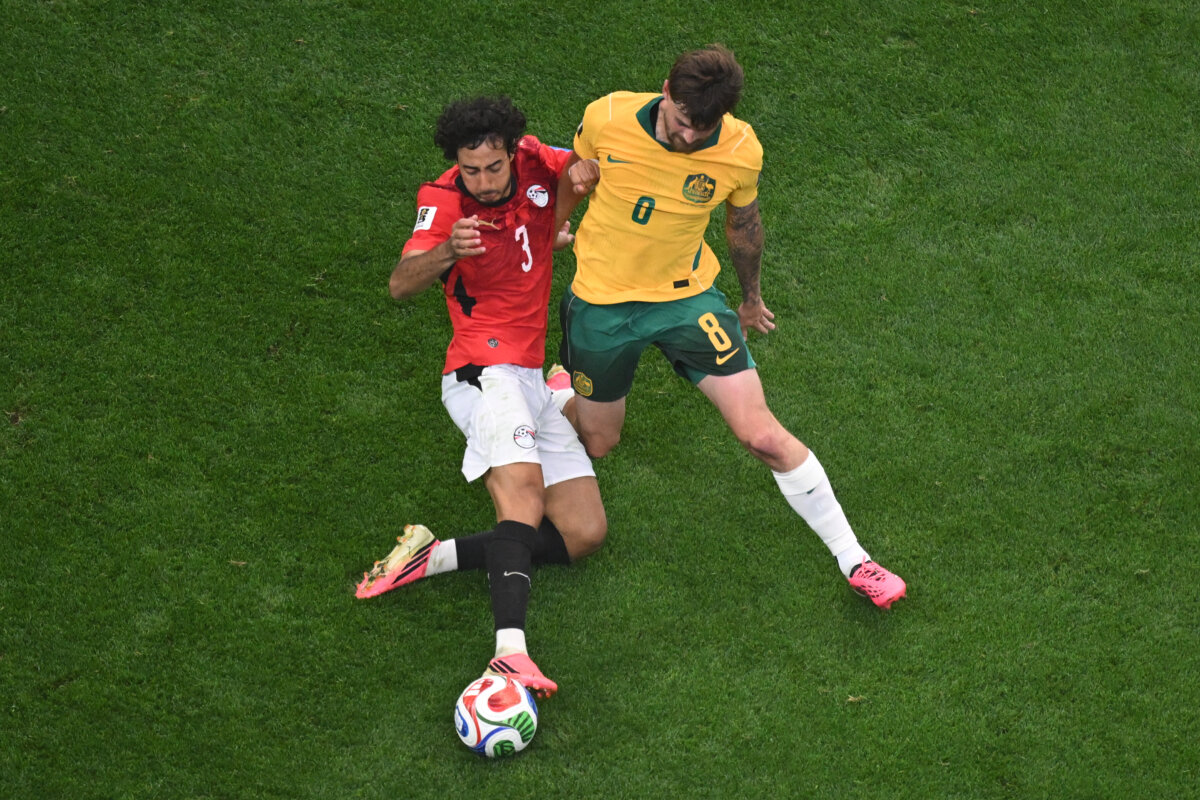 Egypt's Mohamed Hany (3) and Australia's Connor Metcalfe (8) fight for the ball during the World Cup round of 32 soccer match between Australia and Egypt in Arlington, Texas, near Dallas on July 3, 2026. (Jessica Tobias/AP Photo)