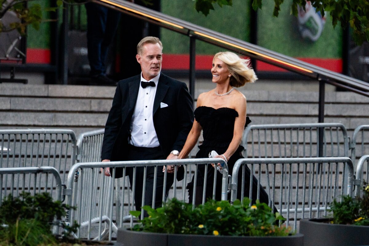 Joe Buck and Michelle Beisner-Buck arrive for Taylor Swift and Travis Kelce's wedding at Madison Square Garden in New York City on July 3, 2026. (Samira Bouaou/The Epoch Times)
