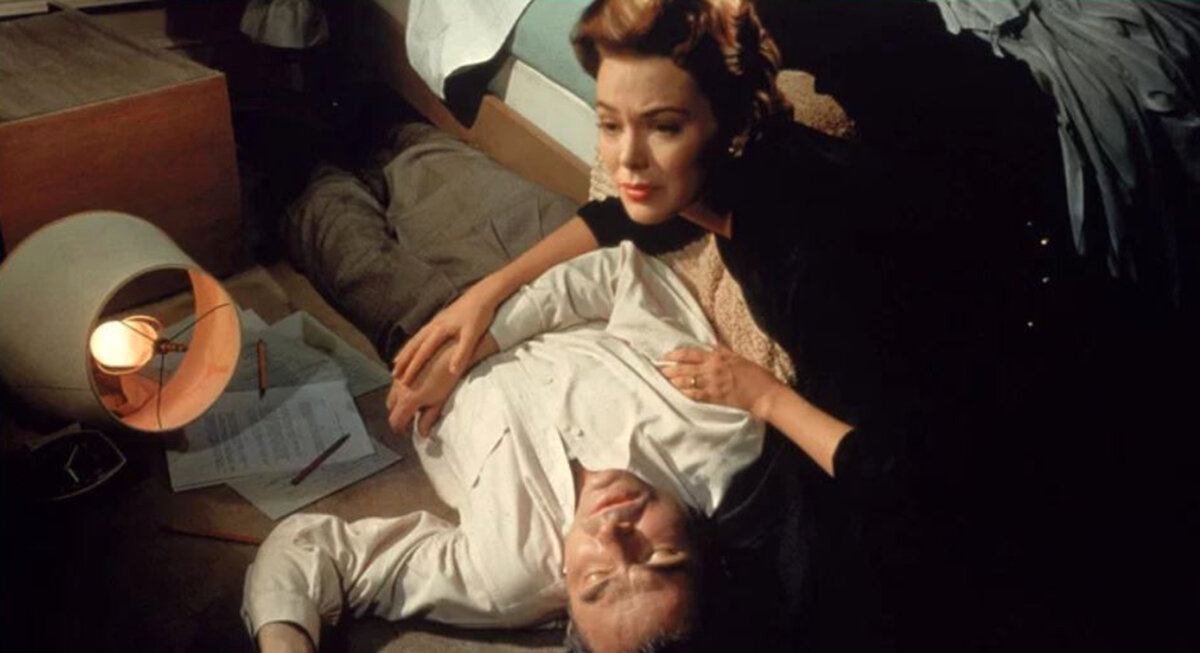 Lou Avery (Barbara Rush) finds her husband, Ed (James Mason), on the floor, in “Bigger Than Life.” (20th Century Fox)