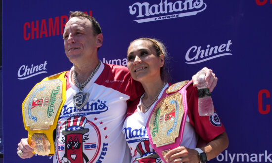 Joey Chestnut Eats 66 Hot Dogs to Again Claim Mustard Belt at Nathan’s Famous Contest