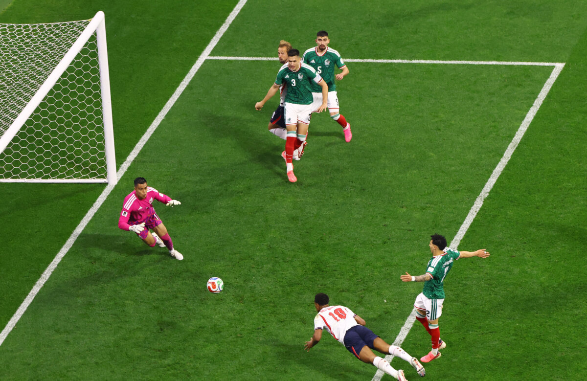 England's Jude Bellingham scores their first goal in their Round of 16 game against Mexico at the FIFA World Cup 2026 in Mexico City's Estadio Azteca on July 5, 2026. (Henry Romero/Reuters)