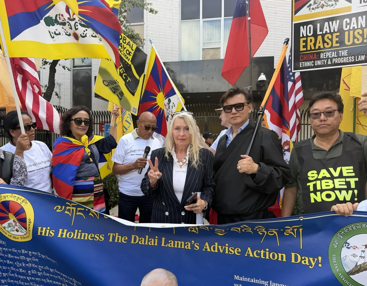 Nearly 100 people from diverse ethnic communities rally outside the Chinese Consulate in Los Angeles on July 1, 2026, condemning the Chinese Communist Party's use of the Ethnic Unity and Progress Promotion Law to justify transnational repression and erode cultural diversity. (Ma Shangen/The Epoch Times)