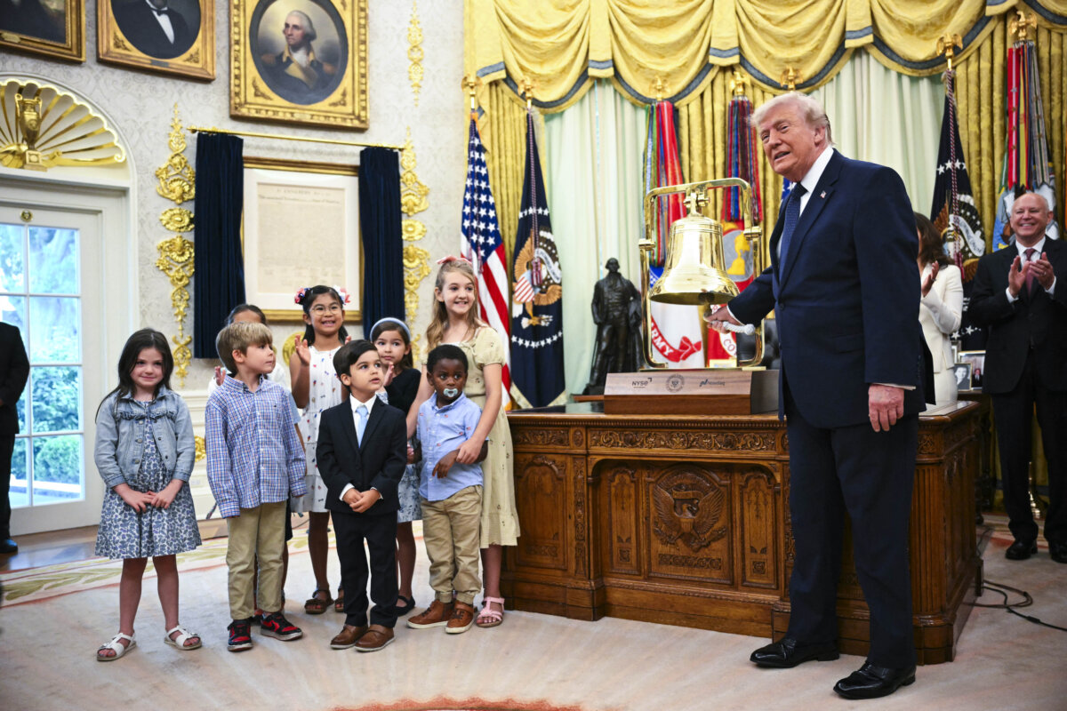 President Donald Trump rings the opening bell for the New York Stock Exchange (NYSE) and Nasdaq during the launch of Trump investment accounts in the Oval Office of the White House in Washington, on July 6, 2026. (Mandel Ngan / AFP via Getty Images)