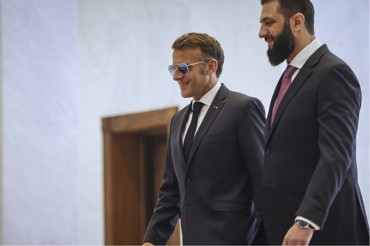Syrian President Ahmad al-Sharaa (R) meets French President Emmanuel Macron (L) at the presidential palace in Damascus, Syria, on July 7, 2026. (Ghaith Alsayed/AP Photo)