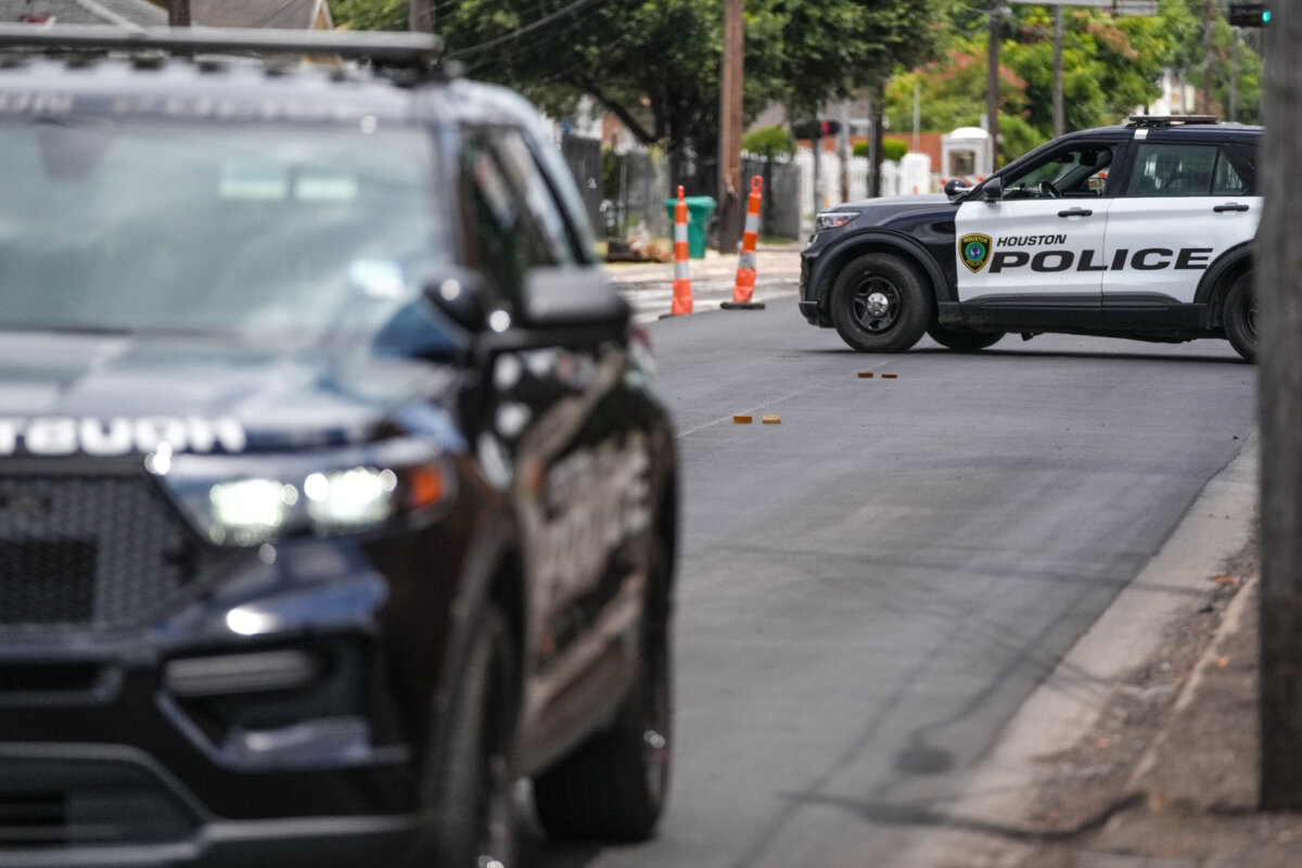 Police work on Canal Street after a shooting in Houston, Texas, on July 7, 2026. (Jacob Lujan/Houston Chronicle via AP)