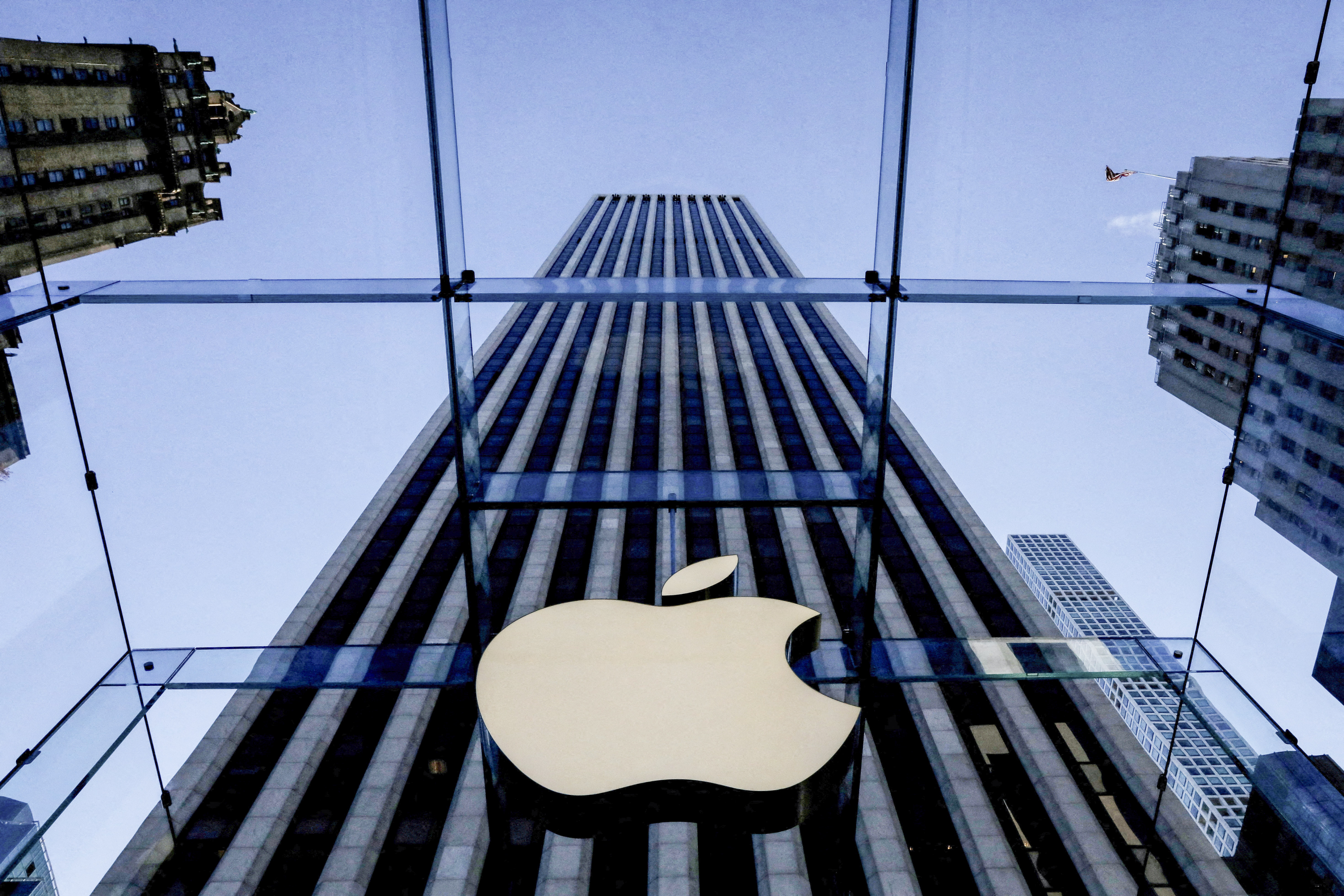 FILE PHOTO: The Apple logo is seen during the preview of the redesigned and reimagined Apple Fifth Avenue store in New York