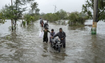 Day in Photos: Heavy Flooding in India, Running of the Bulls, and Underground Aquatic Study