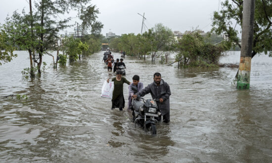 Day in Photos: Heavy Flooding in India, Running of the Bulls, and Underground Aquatic Study