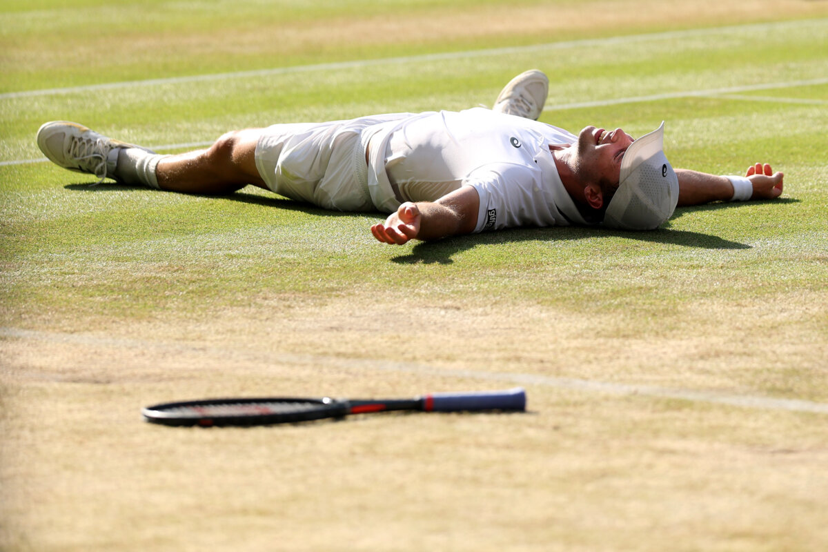 Arthur Fery of Great Britain celebrates victory against Flavio Cobolli of Italy in their quarterfinal match on Day 10 of Wimbledon at the All England Lawn Tennis and Croquet Club in London on July 8, 2026. (Clive Brunskill/Getty Images)