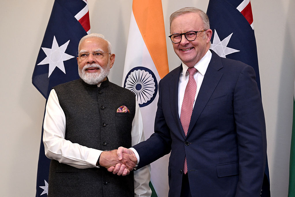 Indian Prime Minister Narendra Modi (L) shakes hands with Australia's Prime Minister Anthony Albanese ahead of the Australia-India Economic Roadmap Business Reception in Melbourne, Australia on July 9, 2026. (William West/AFP via Getty Images)
